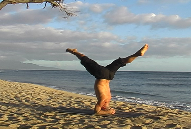 Sun Salute flows through headstand variations and scorpion pose